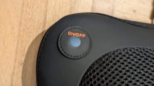 Ein- und Ausschalter des wärmenden Massagekissens